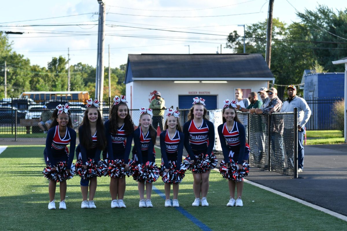 7th grade cheerleaders have fun at the game!