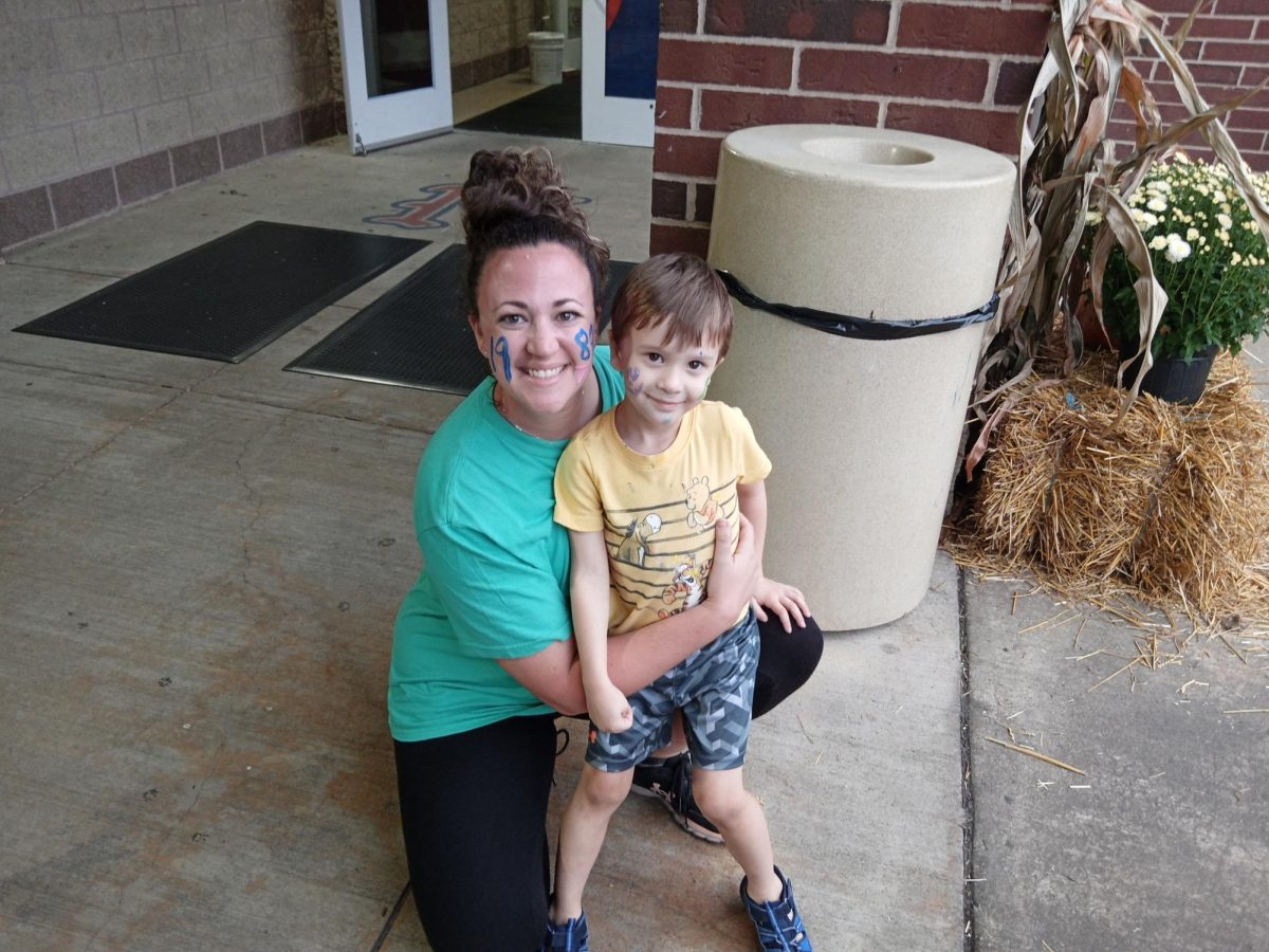 Mrs. Partridge and her son Max having an incredible time at the Harvest Dinner!