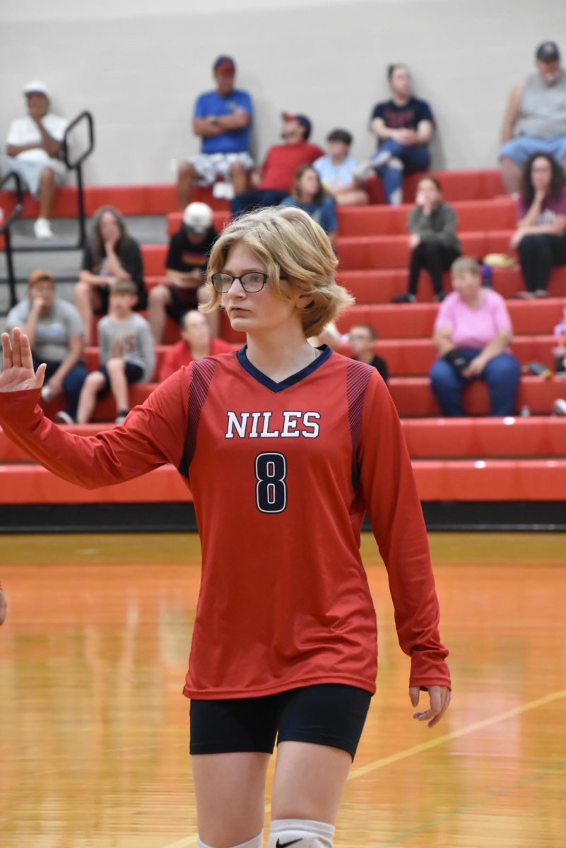 Trinity Broom walking off the court after a good serve recieve!