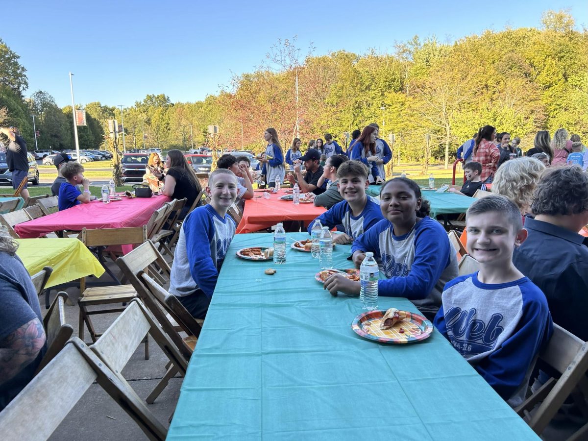 The 8th Grade boys having fun at the Harvest Dinner!