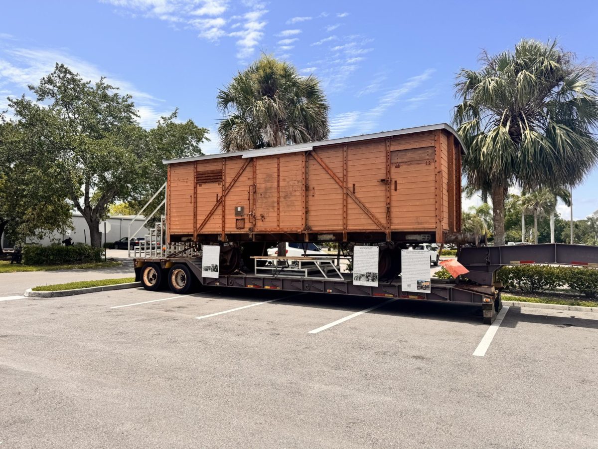 This photo was taken at the Holocaust Museum in. Naples, Florida. This actual cattle car was preserved from its use of transporting victims to their death. It travels around schools in SouthWest Florida but since I was there in the summer, it was on display. 