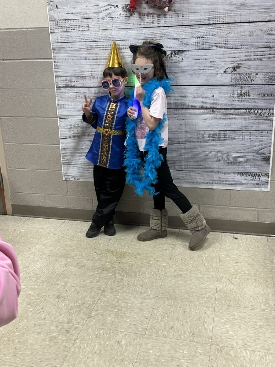 Even though they are not in 8th grade yet, they still are having a bunch of fun at the Sweethearts Dance!